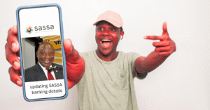 person updating SASSA banking details on a smartphone